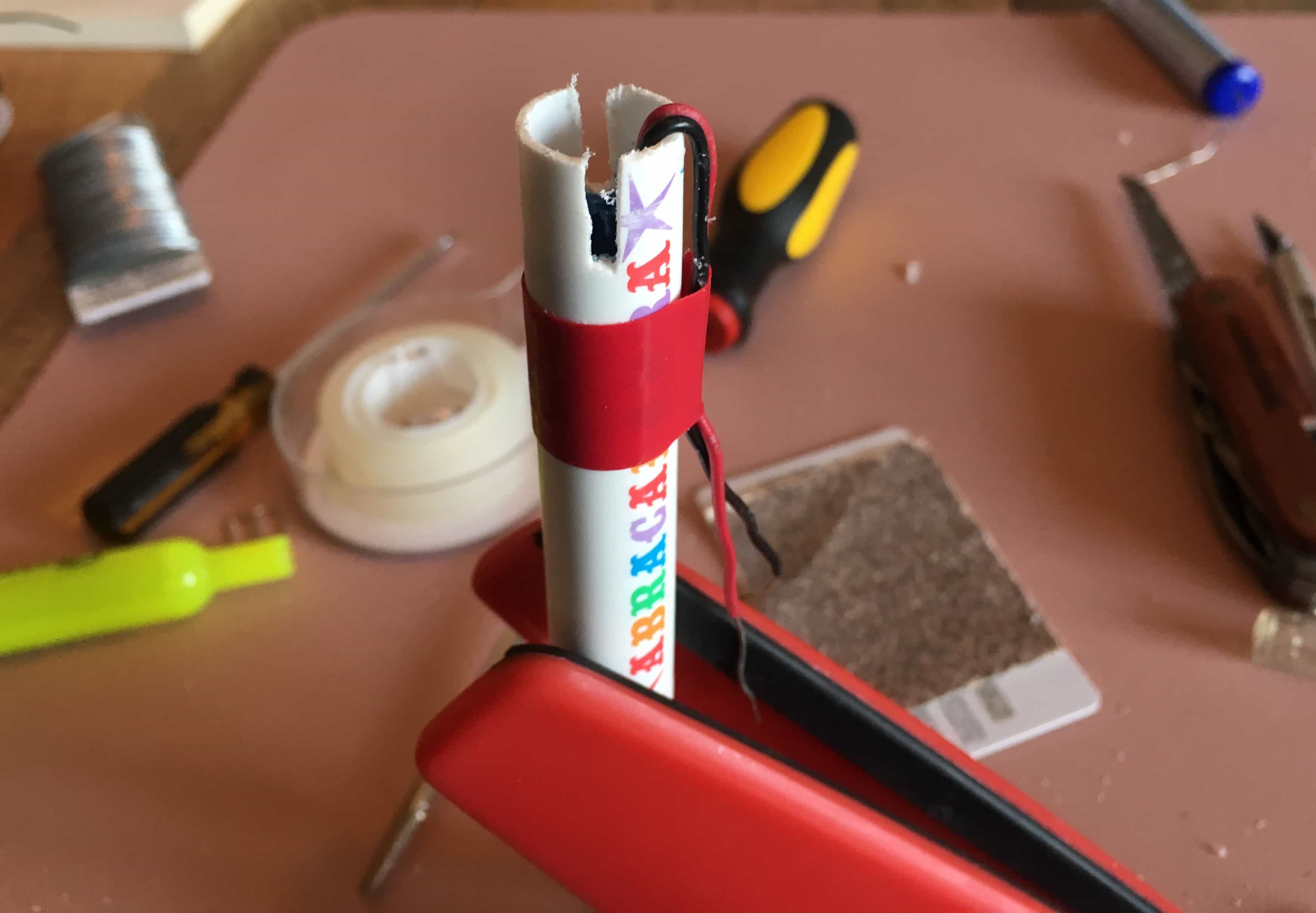 Marker tube with cuts in its base.